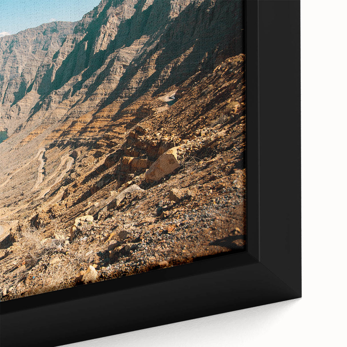 Framed canvas depicting a black textured map of the Middle East with colorful art accents, ideal for living room decor.