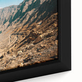 Framed canvas depicting a black textured map of the Middle East with colorful art accents, ideal for living room decor.