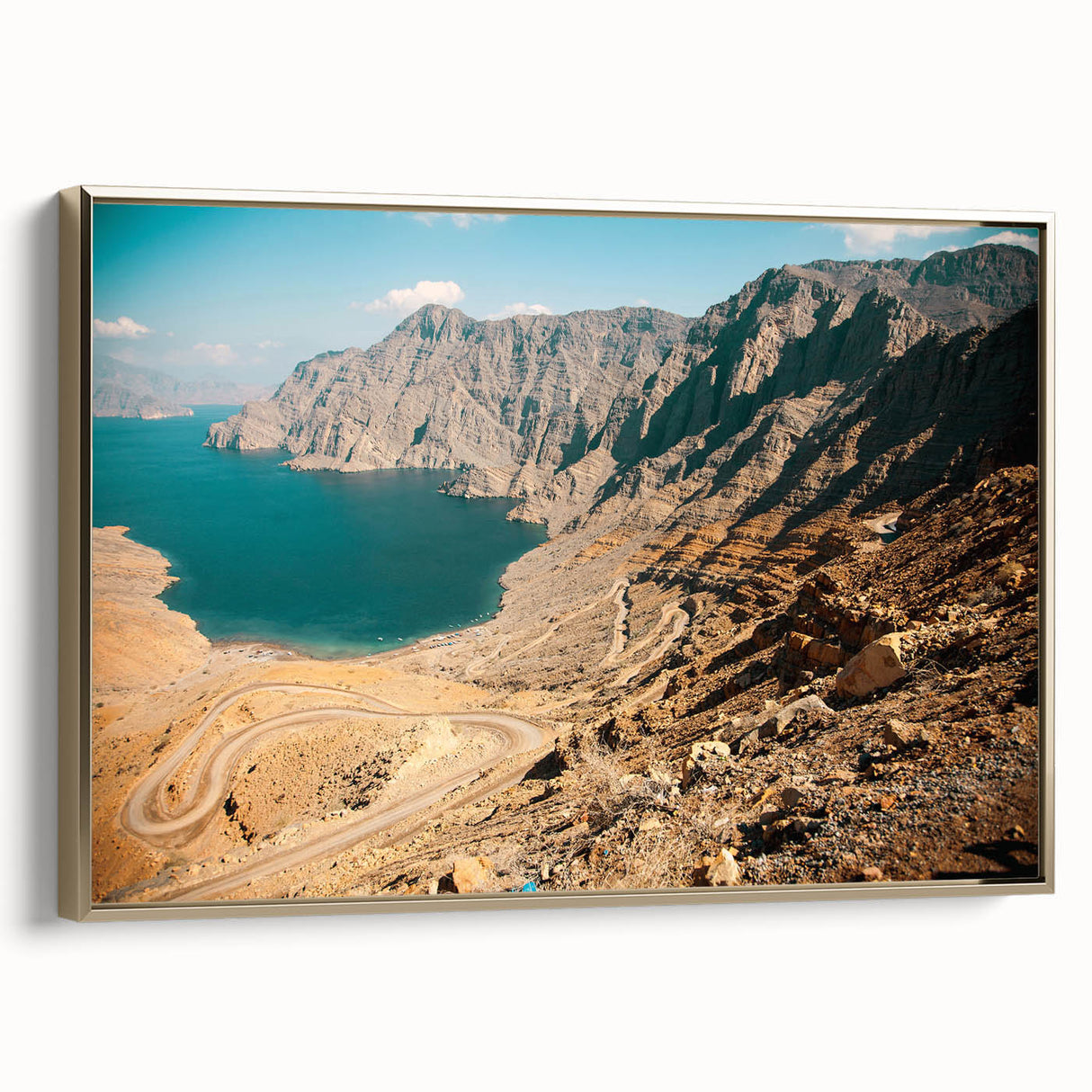 Framed canvas featuring a vintage-style Middle Eastern landscape in gold and black tones, suitable for bedroom wall art.