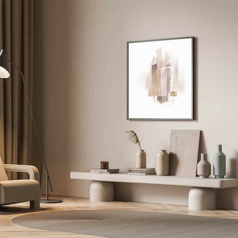 Minimalist abstract wall art with geometric shapes in muted earth tones displayed in a modern neutral-toned living room interior