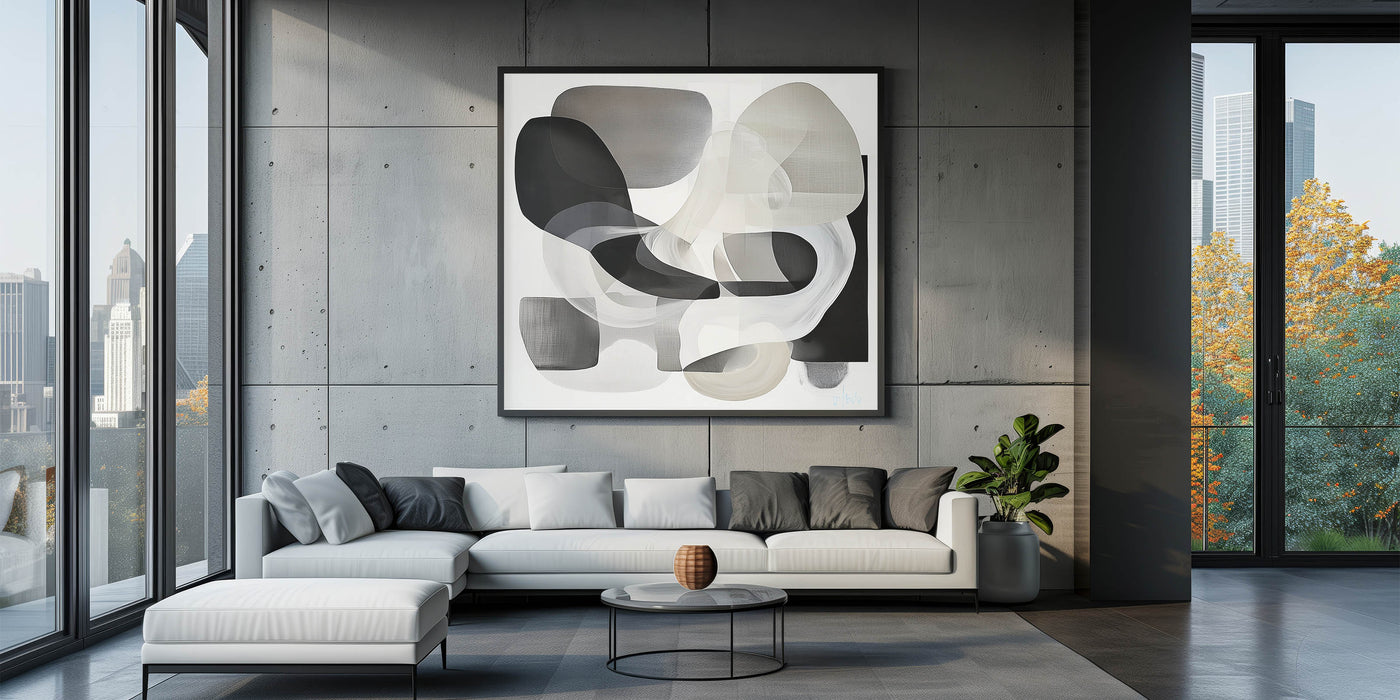 Minimalist modern living room featuring abstract art, neutral decor, and contemporary furniture