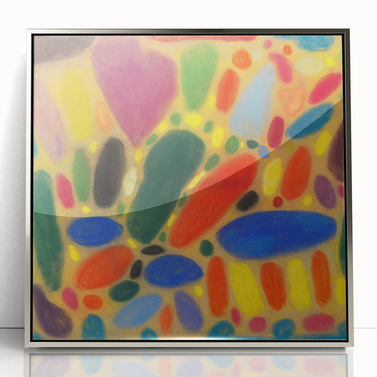 Mid-century modernist art featuring abstract shapes in muted colors on a silver-framed acrylic print.