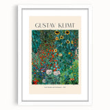 Abstract art print of Gustav Klimt's design in white frame, featuring gold and black swirl patterns.