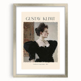 Textured abstract art print featuring muted gold and cream swirls, framed in silver, ideal for bedroom art.