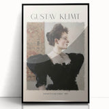 Large abstract wall art depicting a mid-century modernist design in muted gold and black tones on a framed acrylic panel.