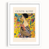 Abstract art print featuring swirling gold patterns on canvas, framed in white, suitable for bedroom or dining room decor.