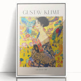 Art deco poster of Gustav Klimt design in white frame, featuring geometric patterns and gold tones.