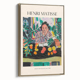 Framed canvas of a Henri Matisse-inspired landscape art painting featuring colorful abstract shapes on a black background.