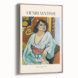 Vintage poster art of a colorful abstract design in a silver frame, ideal for living room decor.