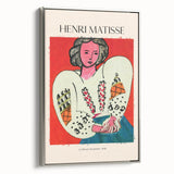 Framed canvas of Henri Matisse-inspired vintage poster art, featuring a colorful abstract design on a black background.