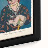 Extra large framed canvas featuring a close-up of a black textured background with colorful abstract designs.