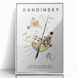 Art deco poster featuring geometric shapes in vibrant primary colors on white acrylic, framed.