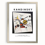 Textured abstract art print in vibrant colors on a silver-framed canvas, ideal for modern bedroom ambiance.