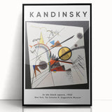 Large abstract wall art featuring swirls of vibrant colors on black acrylic, framed in black.