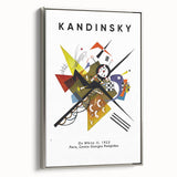 Framed canvas of a Kandinsky-inspired abstract landscape with vibrant colors on a black background.