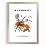 Textured abstract art print in vibrant colors on a framed canvas, suitable for enhancing a modern bedroom.