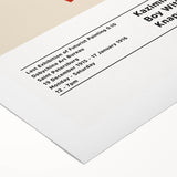 Art deco poster featuring geometric shapes in black and white on rolled canvas.