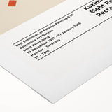 Art deco poster featuring geometric shapes in bold black and white on rolled canvas.