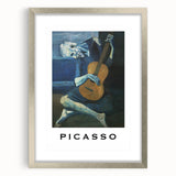 Textured abstract art print featuring geometric shapes in muted colors, framed in silver, ideal for modern bedroom decor.