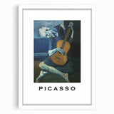 Abstract art print featuring geometric shapes in muted blues and greens, framed with a white mat.