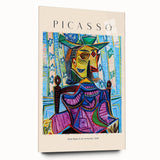 Large abstract wall art on acrylic glass depicting geometric shapes in bold colors.