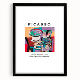 Abstract art print with vibrant, colorful textures on a large canvas, framed in black, ideal for living room decor.