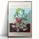 Mid-century modernist art depicting abstract figures in neutral and blue tones on a framed acrylic.