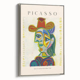 Framed canvas of a colorful, abstract landscape painting with black and vibrant hues, ideal for modern living room decor.