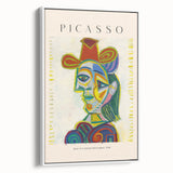 Vintage poster art featuring an abstract Picasso design in colorful art tones on a framed canvas.