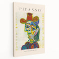 Abstract Picasso-inspired wall art on stretched canvas, featuring a mix of vibrant and muted colors.