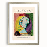 Textured abstract art print in muted earth tones on a framed canvas, ideal for modern bedroom ambiance.