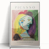 Art deco poster featuring a Picasso-inspired abstract design in muted colors on a framed acrylic.