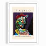 Abstract art print featuring geometric shapes in bold colors on a white framed canvas, suitable for dining room decor.