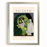 Textured abstract art print in silver frame with mat, featuring chaotic lines and muted colors.