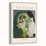 Vintage poster art featuring a Picasso-inspired abstract design in vibrant colors on a large framed canvas.