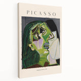 Abstract Picasso-inspired artwork on stretched canvas, featuring geometric shapes in primary colors.