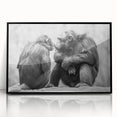 Framed wall art featuring a whimsical design of a monkey and chimpanzee, set against a sleek black frame, perfect for modern decor accents. Ideal for animal lovers and unique home styling.