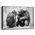 Framed wall art featuring a colorful chimpanzee design, showcasing vibrant hues of blue, yellow, and green against a sleek black frame, ideal for animal lovers.
