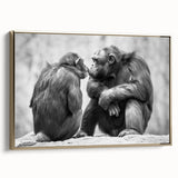 Framed canvas wall art featuring a detailed design of a monkey and an ape, showcasing vibrant colors with a gold frame, perfect for animal lovers' decor.