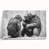 Colorful canvas wall art depicting a playful monkey and chimpanzee in a vibrant jungle setting, perfect for children's room decor or animal-themed spaces.