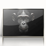 Framed wall art collection featuring a striking design of a monkey and chimpanzee, showcased in a sleek silver frame, perfect for nature-themed decor.