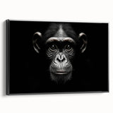 Framed wall art featuring a vibrant chimpanzee and monkey design in rich colors, displayed against a sleek black background, ideal for animal lovers and modern decor.