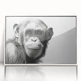 Framed wall art featuring a playful monkey and chimpanzee design, showcasing vibrant colors and intricate details, perfect for animal lovers and modern decor.