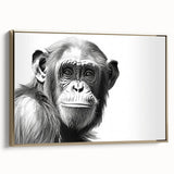 Framed canvas wall art featuring a playful monkey and chimpanzee design in vibrant colors, ideal for children's rooms or animal-themed decor, displayed from a side view.