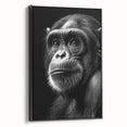 Framed wall art showcasing a vibrant chimpanzee design in black and white, ideal for animal lovers and modern decor; side view highlighting the artwork’s details.