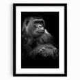 Framed wall art design featuring a playful monkey and ape gorilla illustration in a modern black frame with a white mat, perfect for animal-themed decor.
