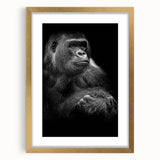 Framed wall art featuring a playful monkey and gorilla design, set in a gold frame with a mat, perfect for adding a vibrant touch to modern home decor.
