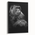 Framed canvas wall art featuring a striking design of a monkey and ape gorilla, presented in a sleek black frame, showcasing vibrant colors and intricate details, perfect for animal-themed decor.