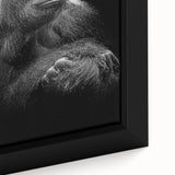 Close-up of a framed canvas wall art featuring a vibrant monkey and ape gorilla design, showcasing intricate details and bold colors, perfect for animal-themed decor.