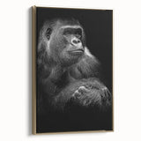 Framed wall art showcasing a striking design of a monkey and ape gorilla, with a gold frame and side view, perfect for adding a bold touch to any modern decor.